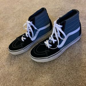 Blue and black high top platform vans